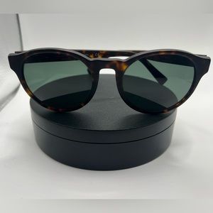COACH.  wythe round sunglasses lt1095